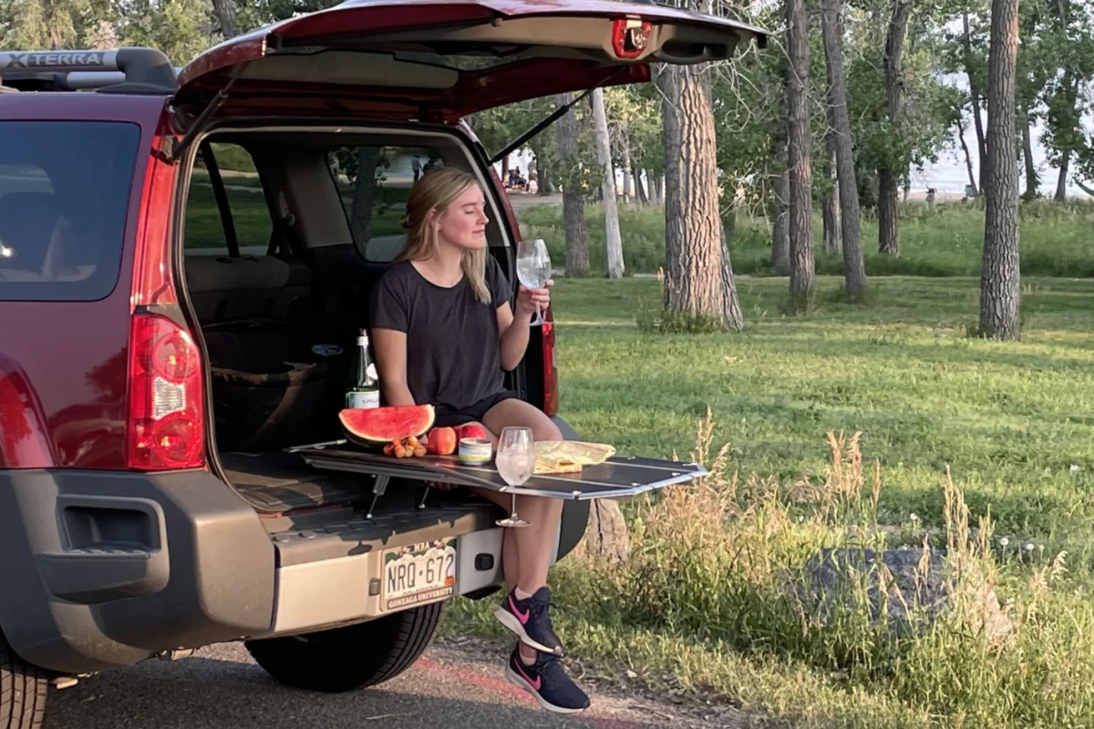 Whether you're road tripping and need to stop for a meal or pulling up for full-blown tailgate festivities, table space is always a welcome addition, and the Tail Table delivers it