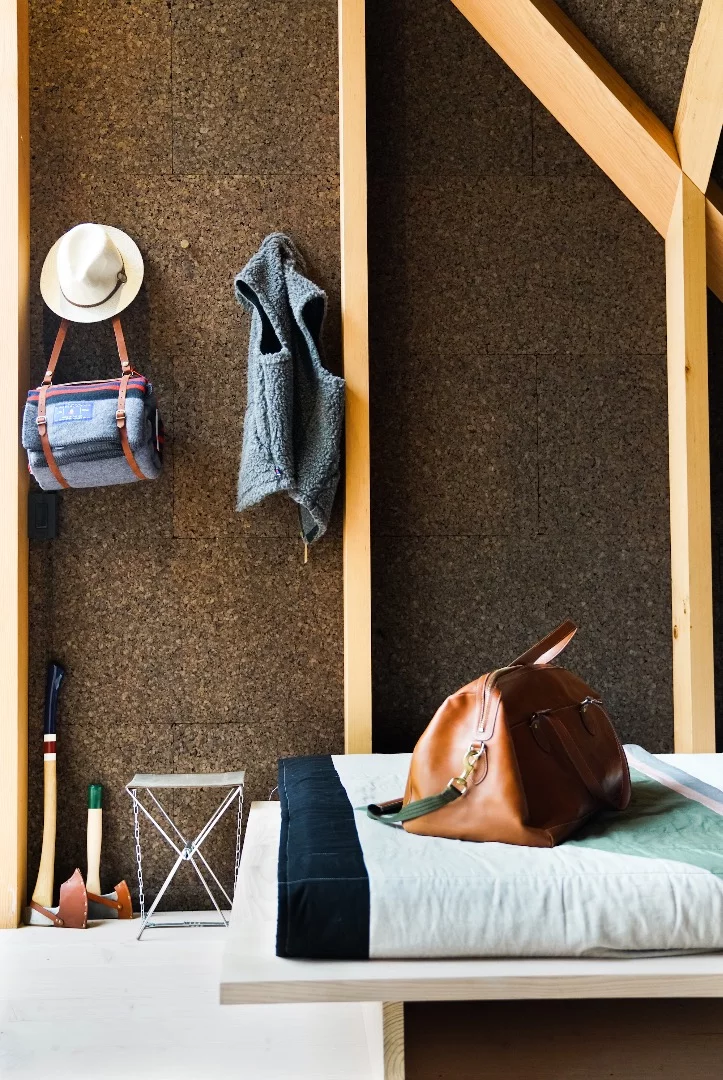 A45 has an interesting triangular form inspired by the classic A-frame that offers a maximum ceiling height of 13 ft (4 m)