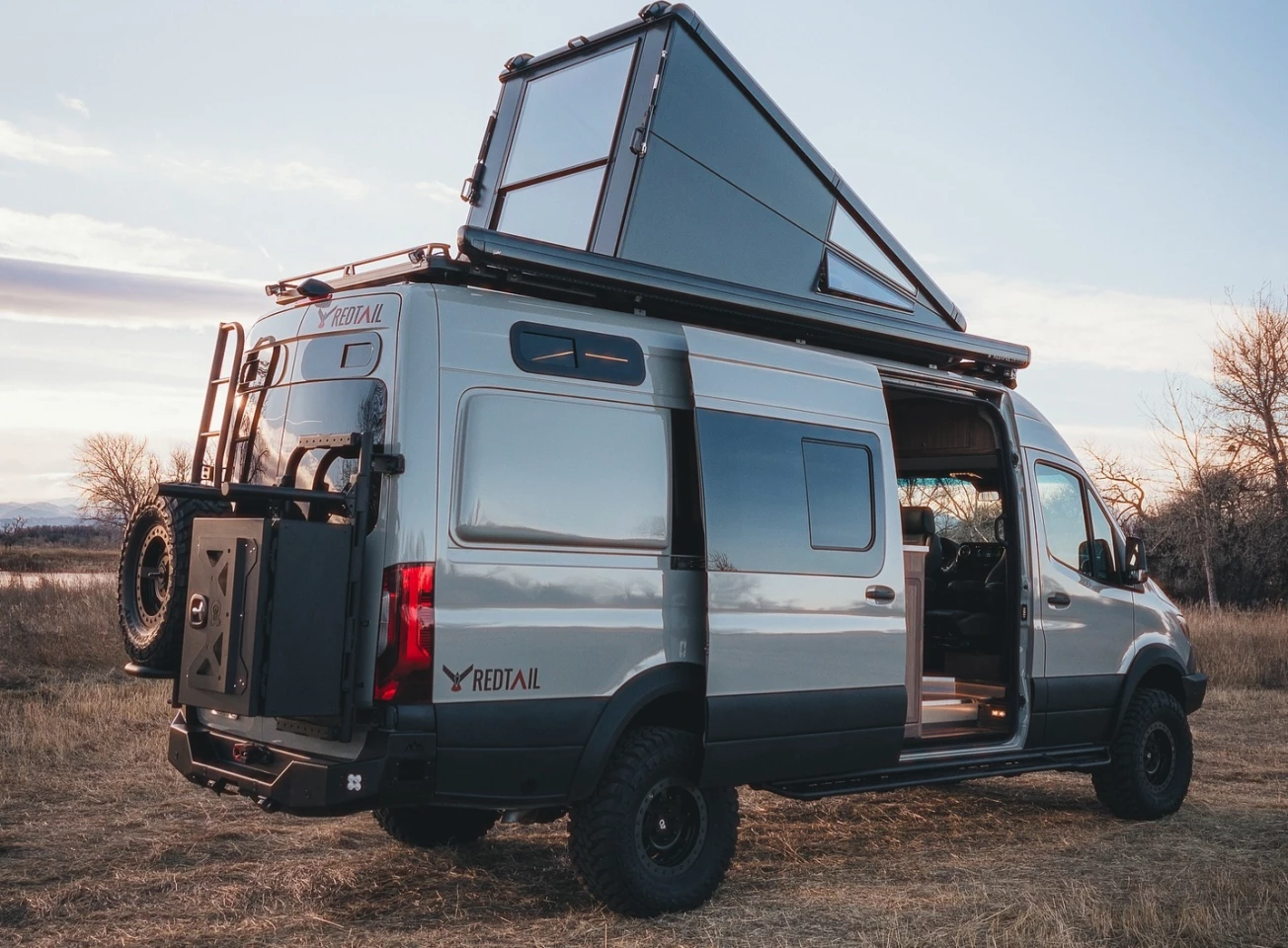 Taking a break from selling hard-sided rooftop campers for $20K+ a pop, Colorado's Redtail Overland has designed a meticulously specced $530,000 camper van with integrated hard-sided roof camper