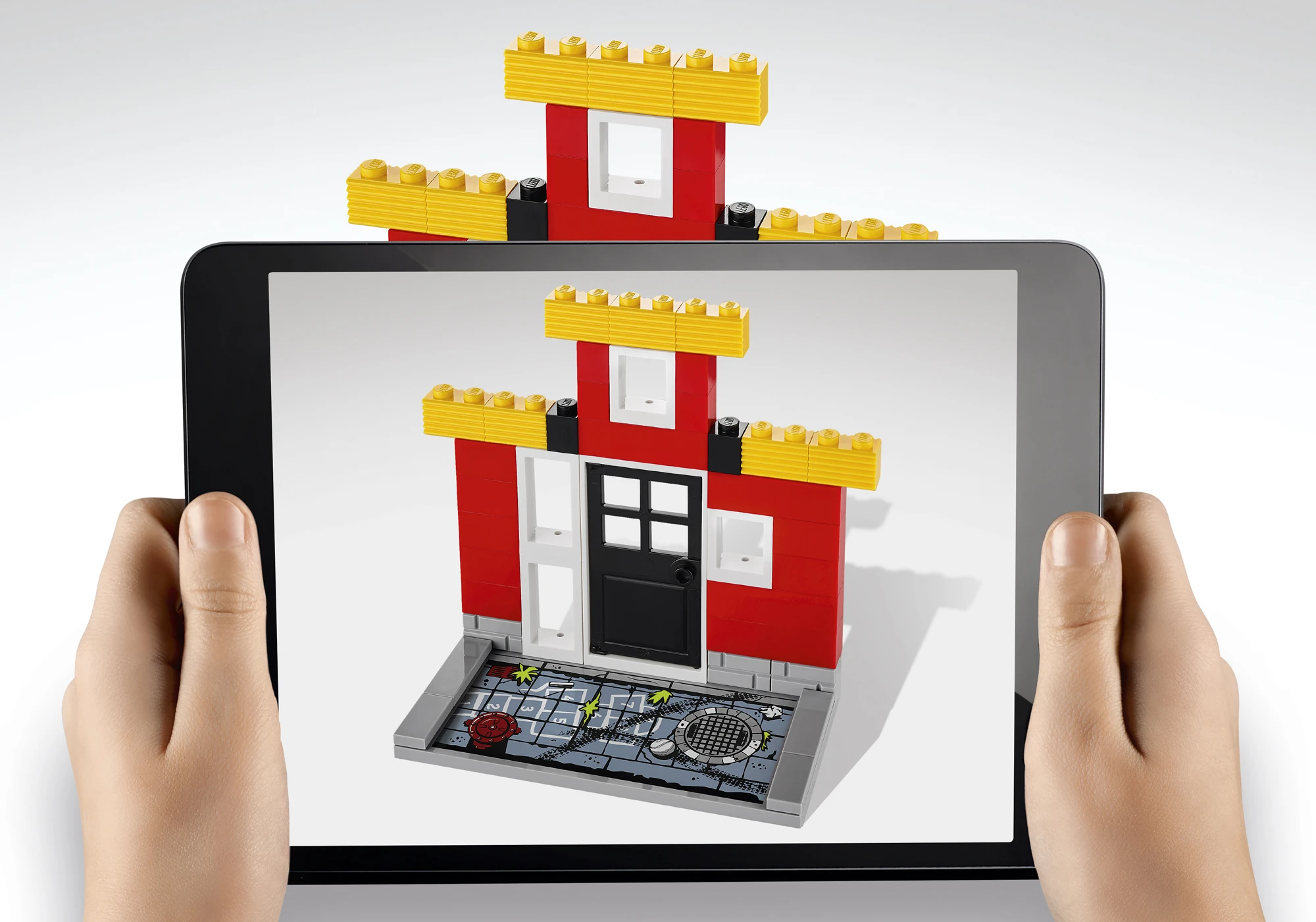 The Lego Fusion capture plate allows the app to identify the size and colors of the Lego bricks used