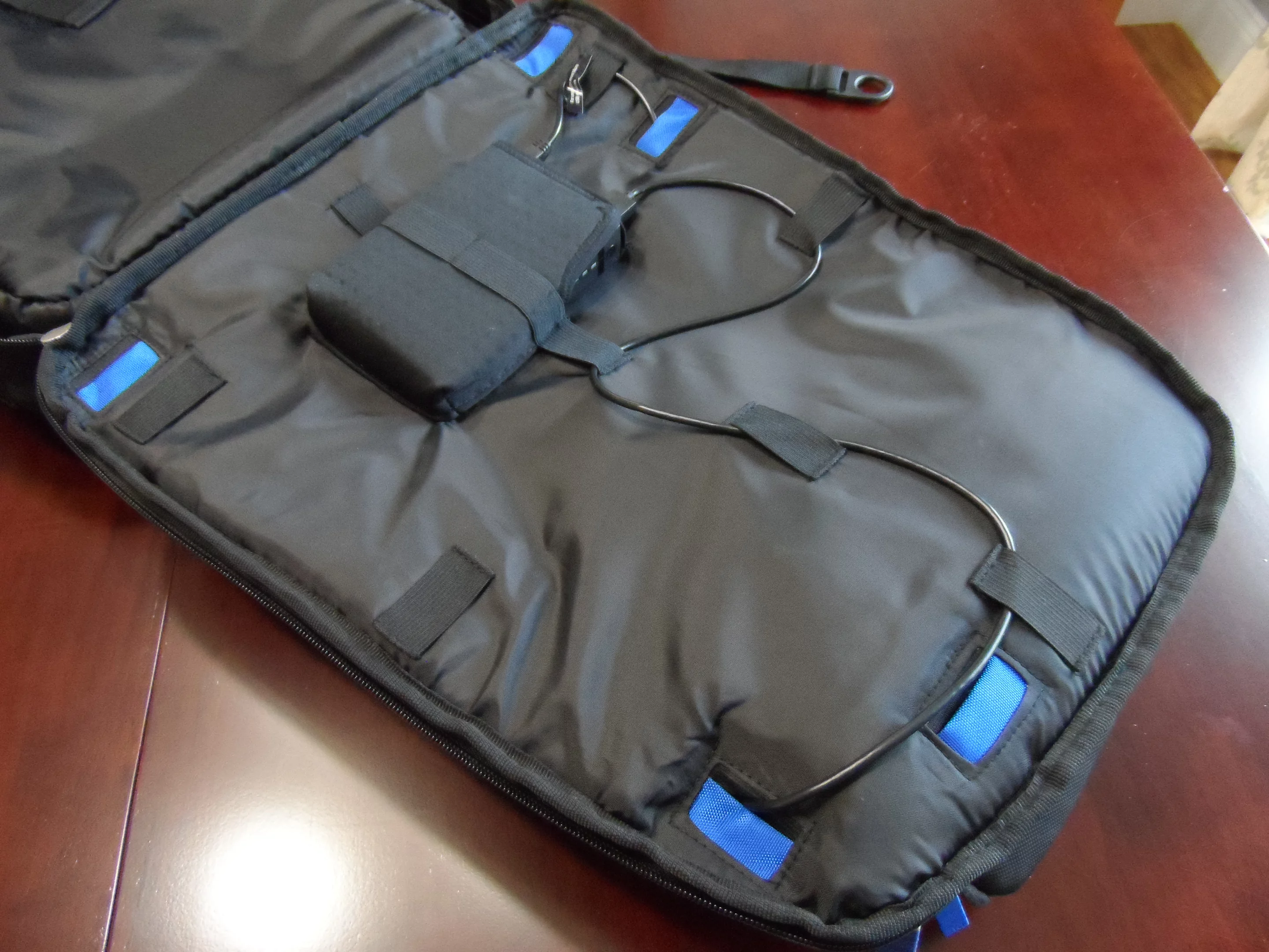 The Energi+ backpack's battery and cord management area