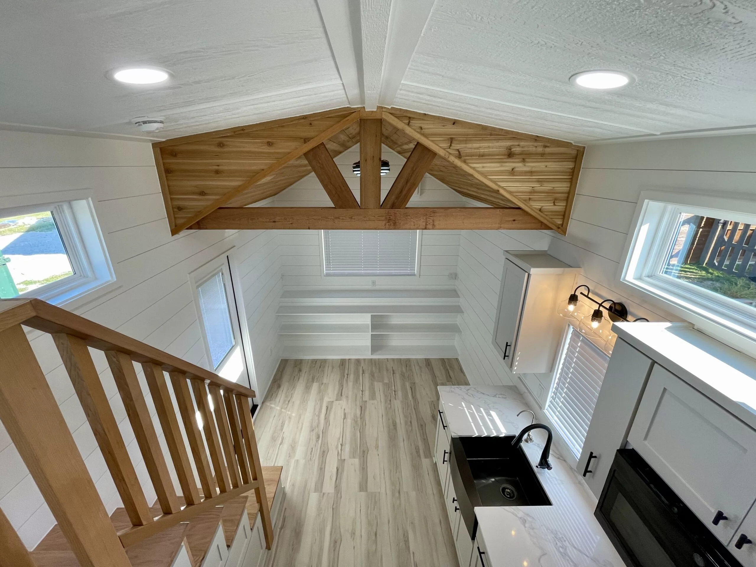 The New Chapter's spacious living area is enlivened by a decorative wooden ceiling