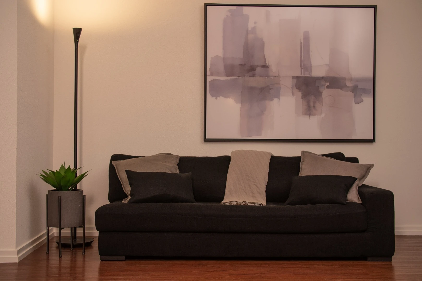 The upfiring lamp of the HomeHawk Floor can be activated when motion sensors detect someone entering the room