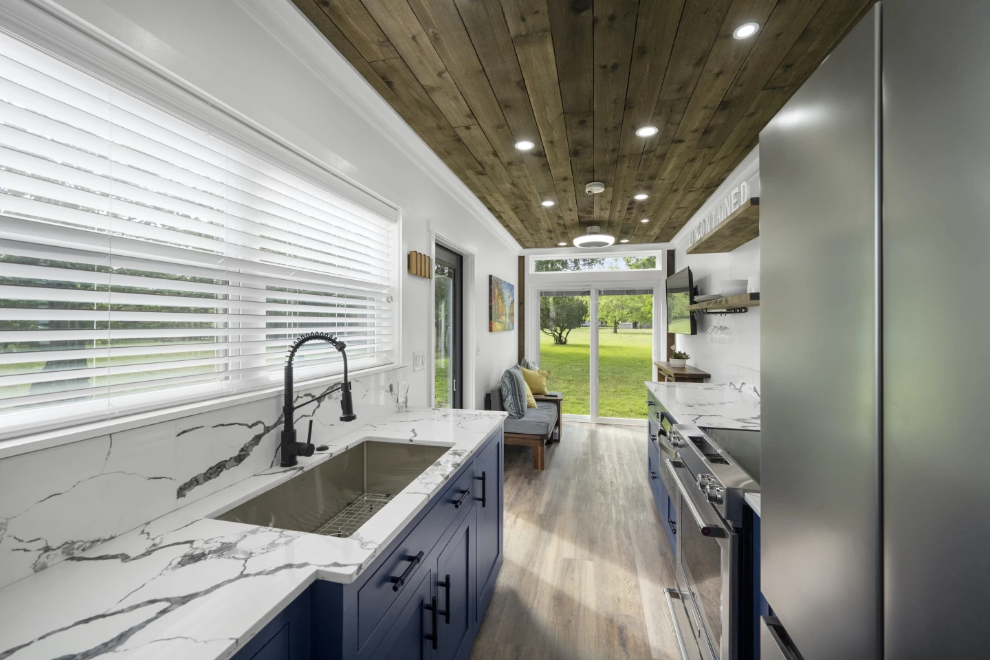 The Rising Sun's interior opens up to the outside with large double glass doors installed in the living room