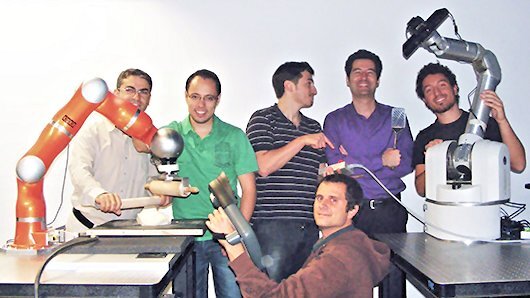 Professor Sylvain Calinon and his robotics group at the Italian Institute of Technology (Photo: IIT)