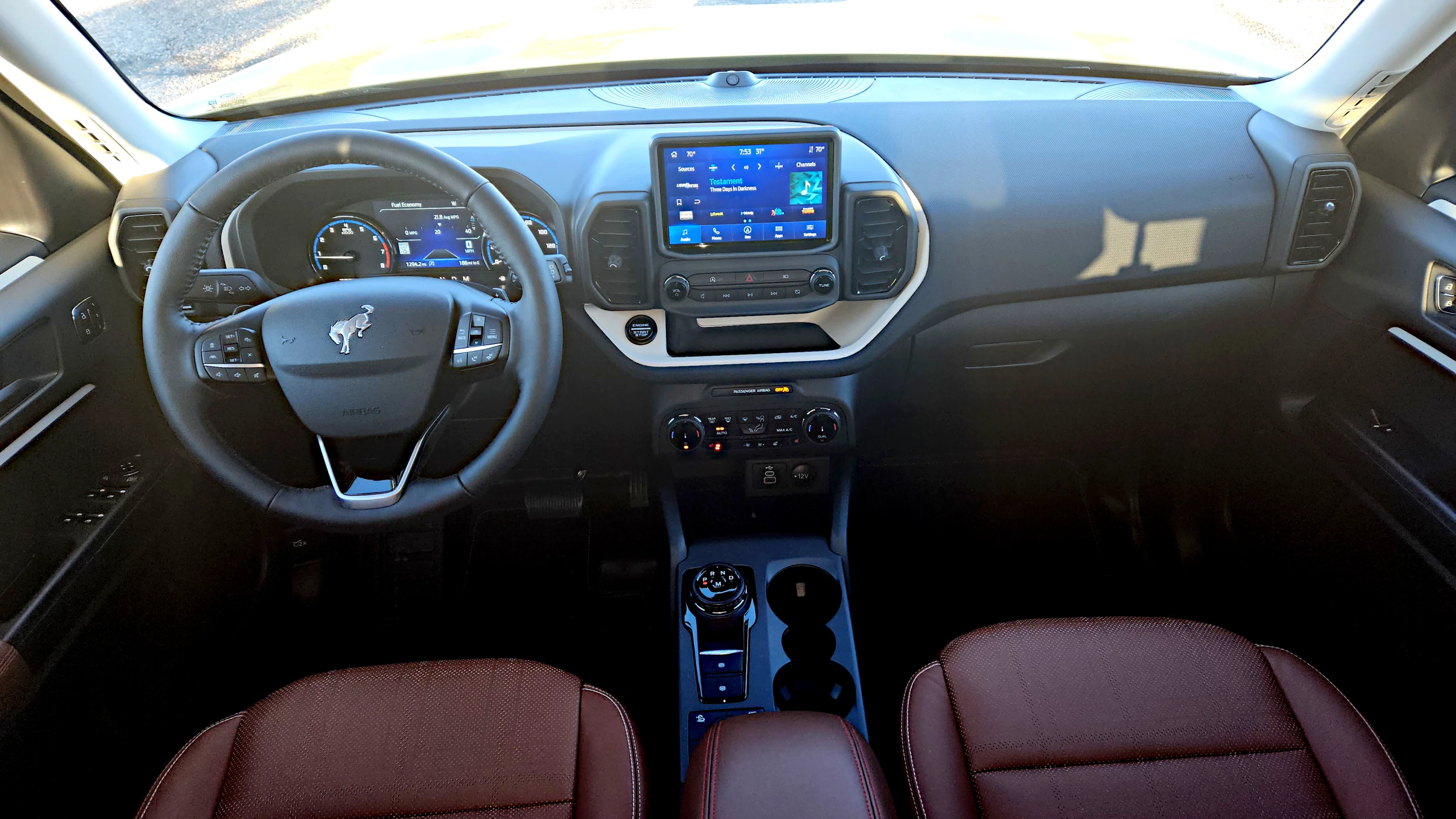 Blue accents, plaid seating cushions, plus red and blue stitching are part of the Heritage Edition interior