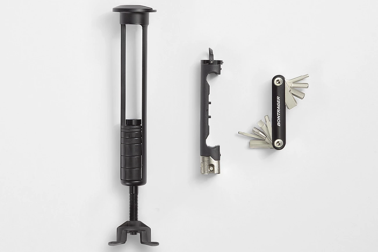 The BITS housing (left), along with the two parts of the actual multitool