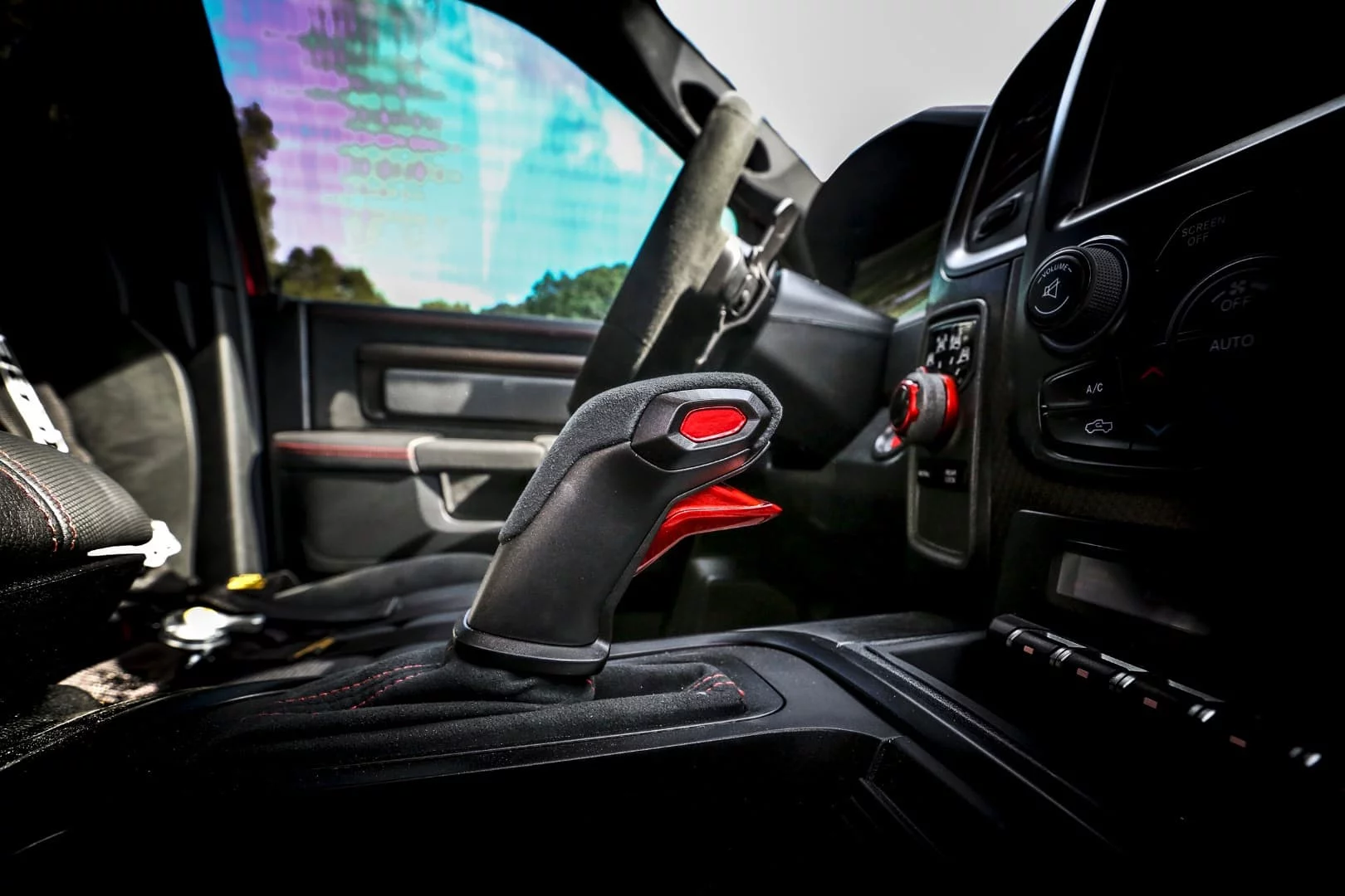 RAM has made the interior look a bit fancier with some red detailing in the TRX