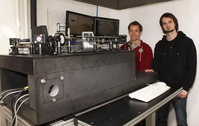 TU Vienna's Jan Torgersen (left) and Peter Gruber, with the 3D printer