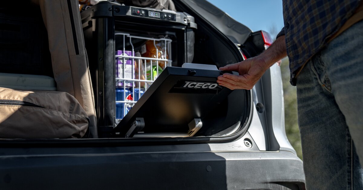 Trapdoor camping fridge keeps cold drinks milliseconds away