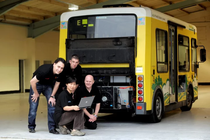 The University of Sunderland's Dirk Kok, Mark Armstrong, Maggie Ren and Adrian Morris with the green bus