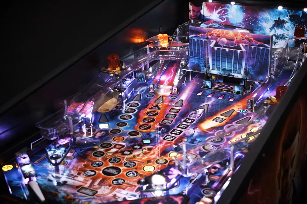 A pinball machine packed with Stranger Things references and art
