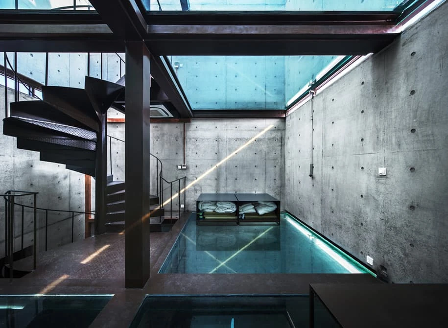 The home is mostly built from glass and steel except for the facade, which is predominantly concrete