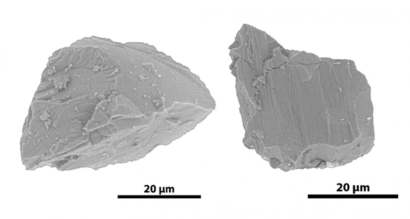 The two particles from Itokawa that were found to contain the mineral pyroxene, which has water in its crystal structure