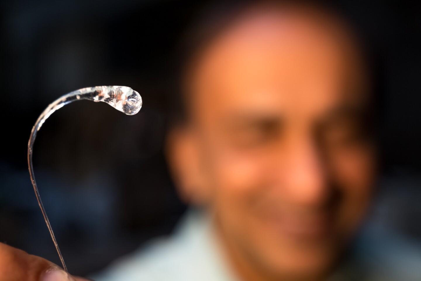 Srinivasan Chandrasekar, a Purdue University professor of industrial engineering, displays a Prince Rupert’s drop