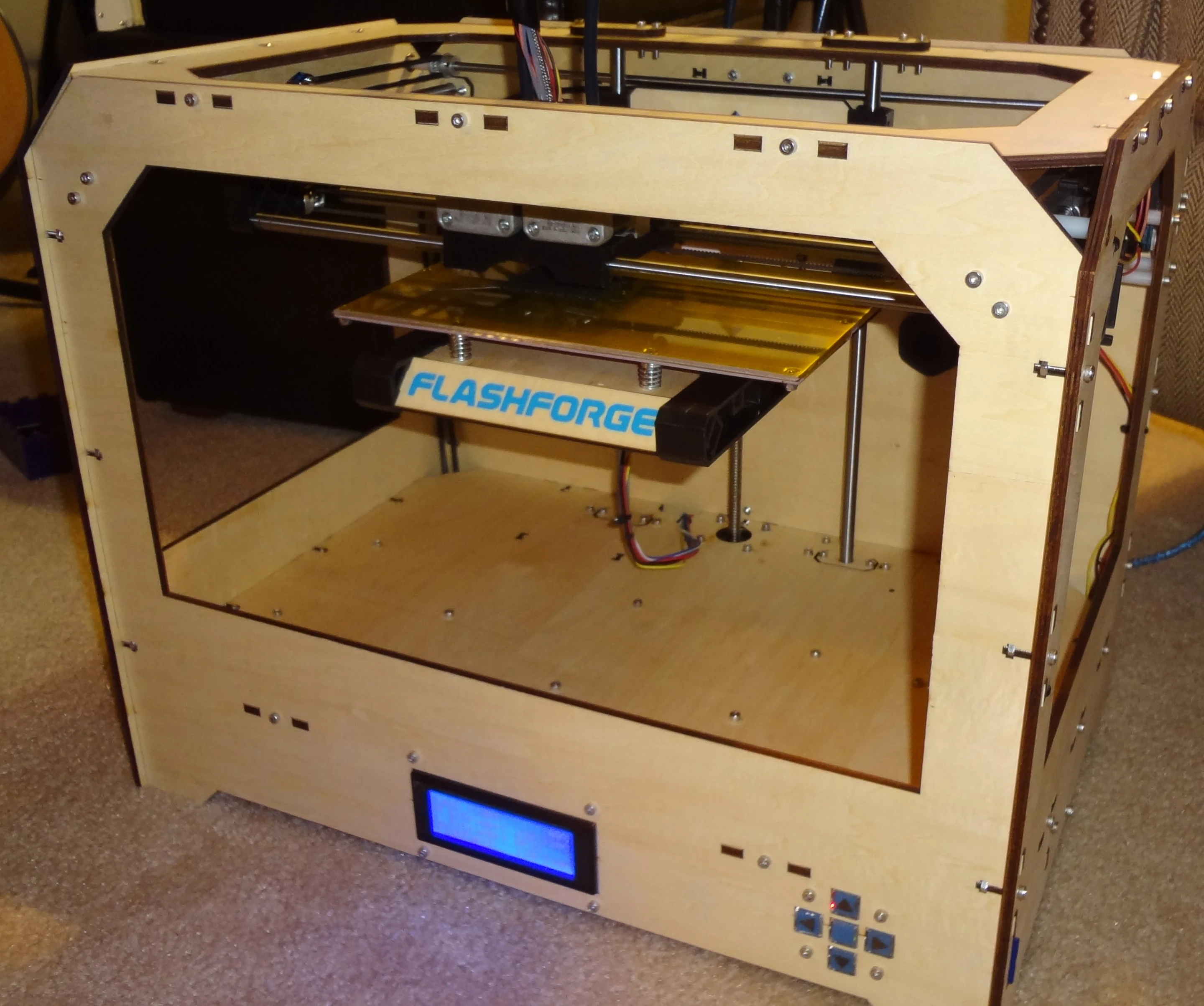 The Flashforge 3D printer is made in China, and has dual extruders (prints in two colors) and a 22.5 cm (9 inch) build platform. At $1,100 US it is one of the lowest cost assembled printers you can buy (Photo: Gizmag)