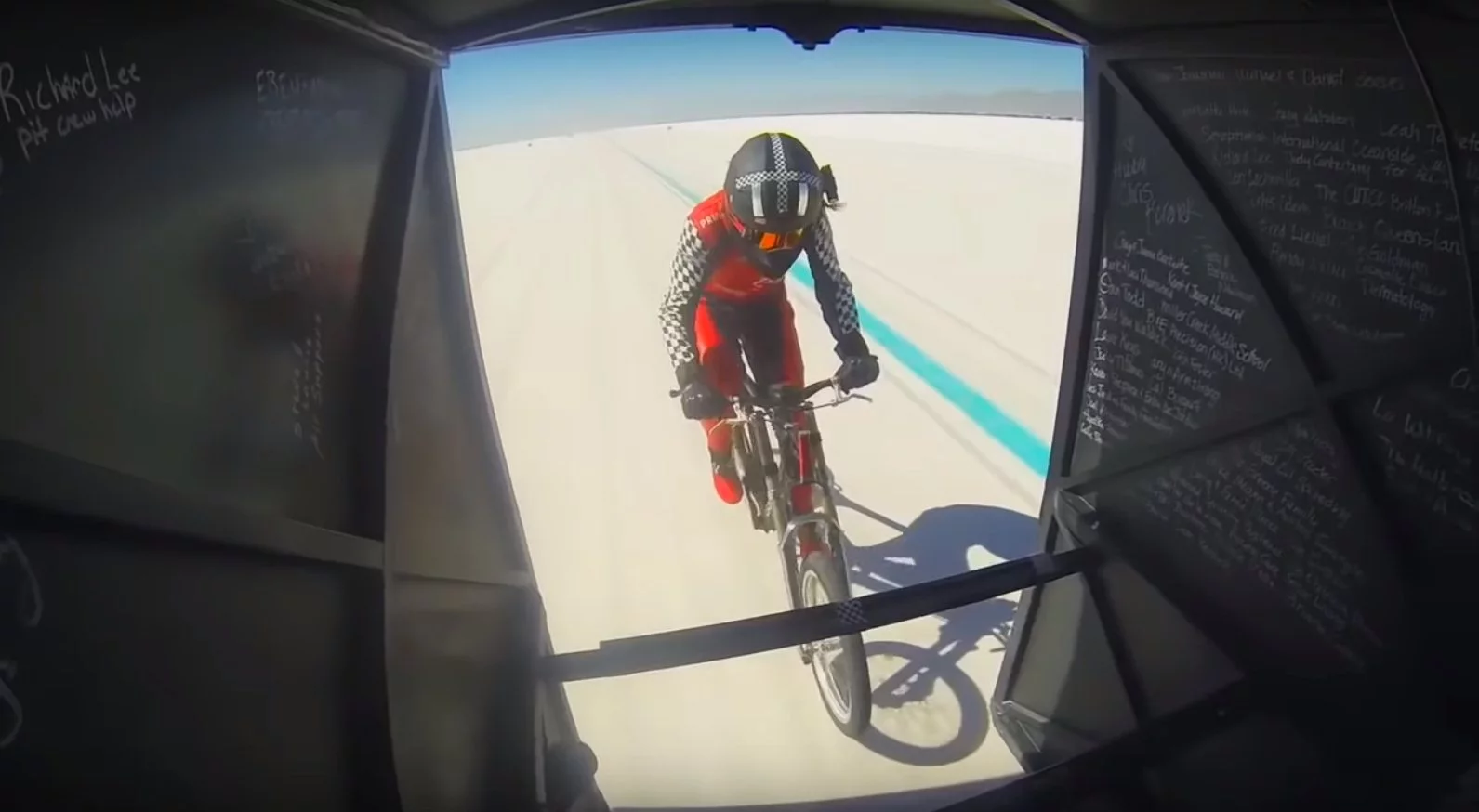 Denise Mueller-Korenek tucked in behind a dragster driven by Shea Holbrook during the motor-paced record run on Sunday September 16, 2018