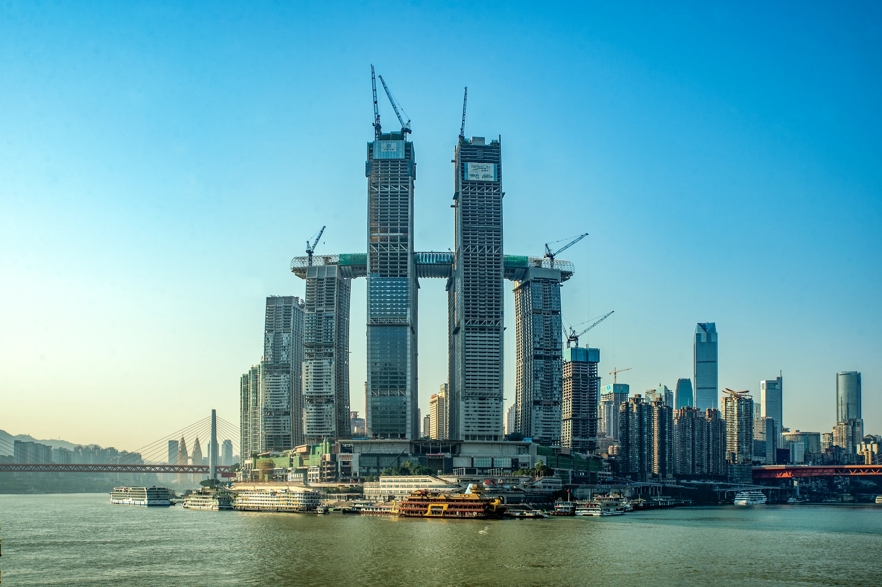 Moshe Safdie's Raffles City Chongqing includes a cluster of eight skyscrapers, plus its horizontal skyscraper, which is now complete