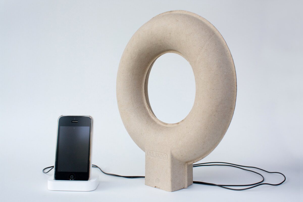 The doughnut-shaped Pulpop MP3 speaker from Balance Wu Design is made from recycled paper pulp and uses flat vibration speaker technology to amplify the source audio through the surface on which it stands and the space inside its hollow ring