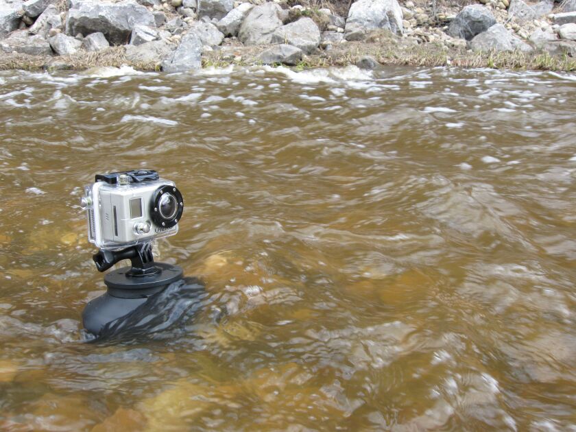 The Flex Shot in use in a swiftly-flowing creek