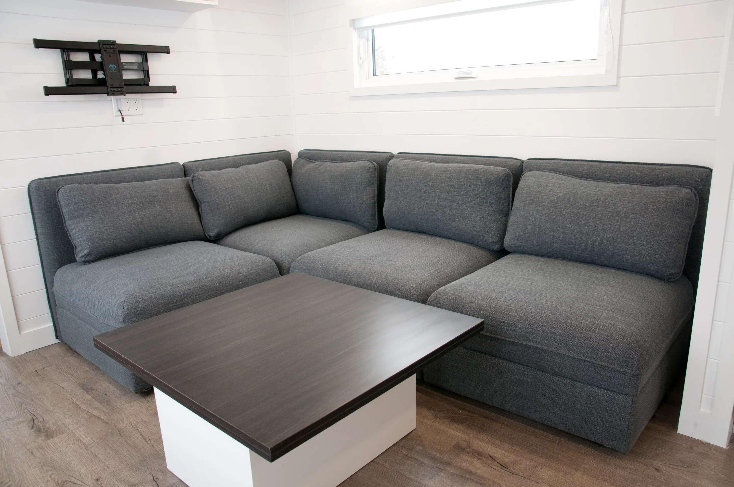 The Charme's living room has a small dining table