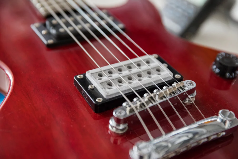 The ōPik is a powered pickup, and will ship with a 9-volt power supply that can be mounted to a pedalboard