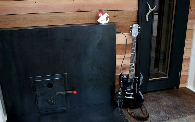 The wood-burning oven that heats up Sauna Box, as seen from outside when not in use