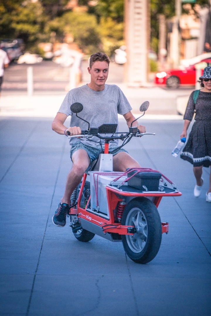 Gizmag's Scott Collie looking deeply uncomfortable aboard the EsCargo