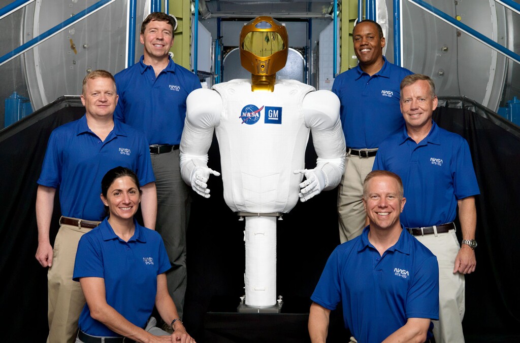 R2 and the STS-133 Crew (Image: NASA)