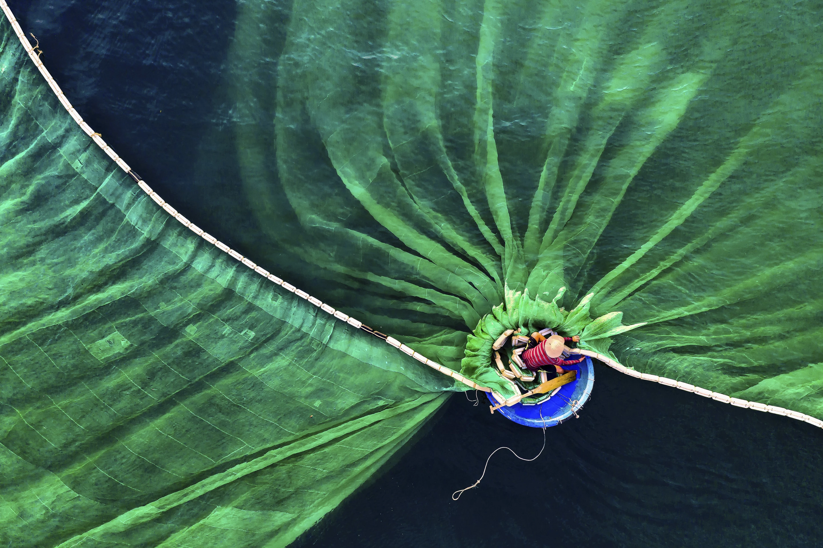 First Place, People in Nature. Fisherman in Hon Yen, Phu Yen, Vietnam.