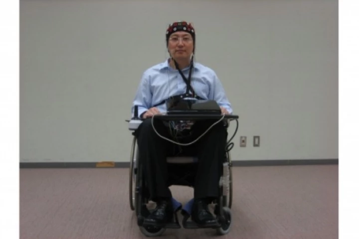 The Toyota/RIKEN wheelchair - this laboratory prototype runs with the EEG detector run by a laptop (Photo: RIKEN)