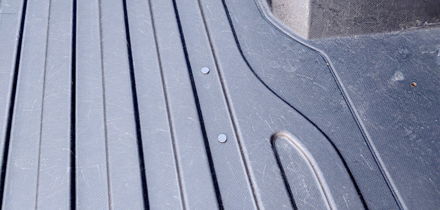 The corrugations pressed into the GMC CarbonPro bed give the non-slip benefits of a spray-in liner without the added weight