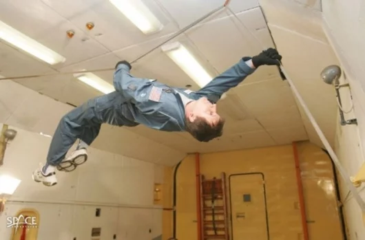 Charles Simonyi in zero gravity training at the International Space Station