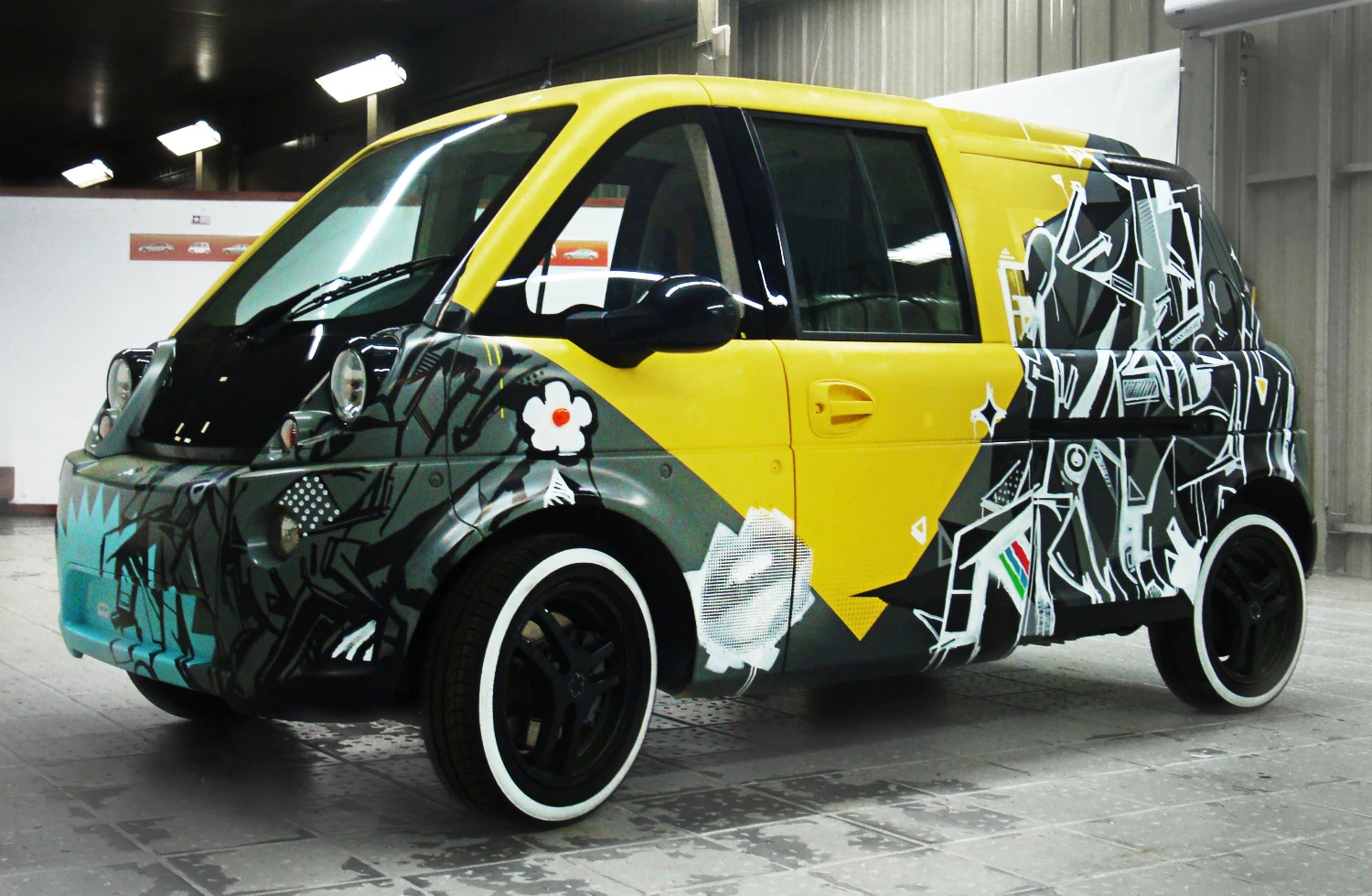 The custom-finished mia U with 14-inch rims surrounded by Michelin green energy tires