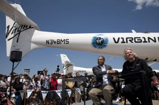 Sir Richard Branson looks suitably happy on receiving a USD$280 million investment