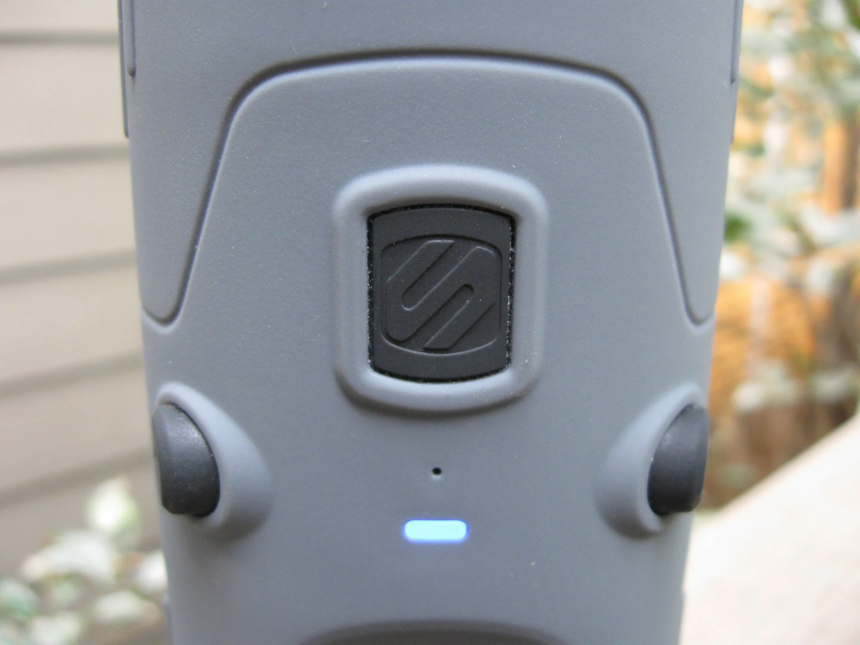 The BoomBottle's multifunction button and two volume buttons