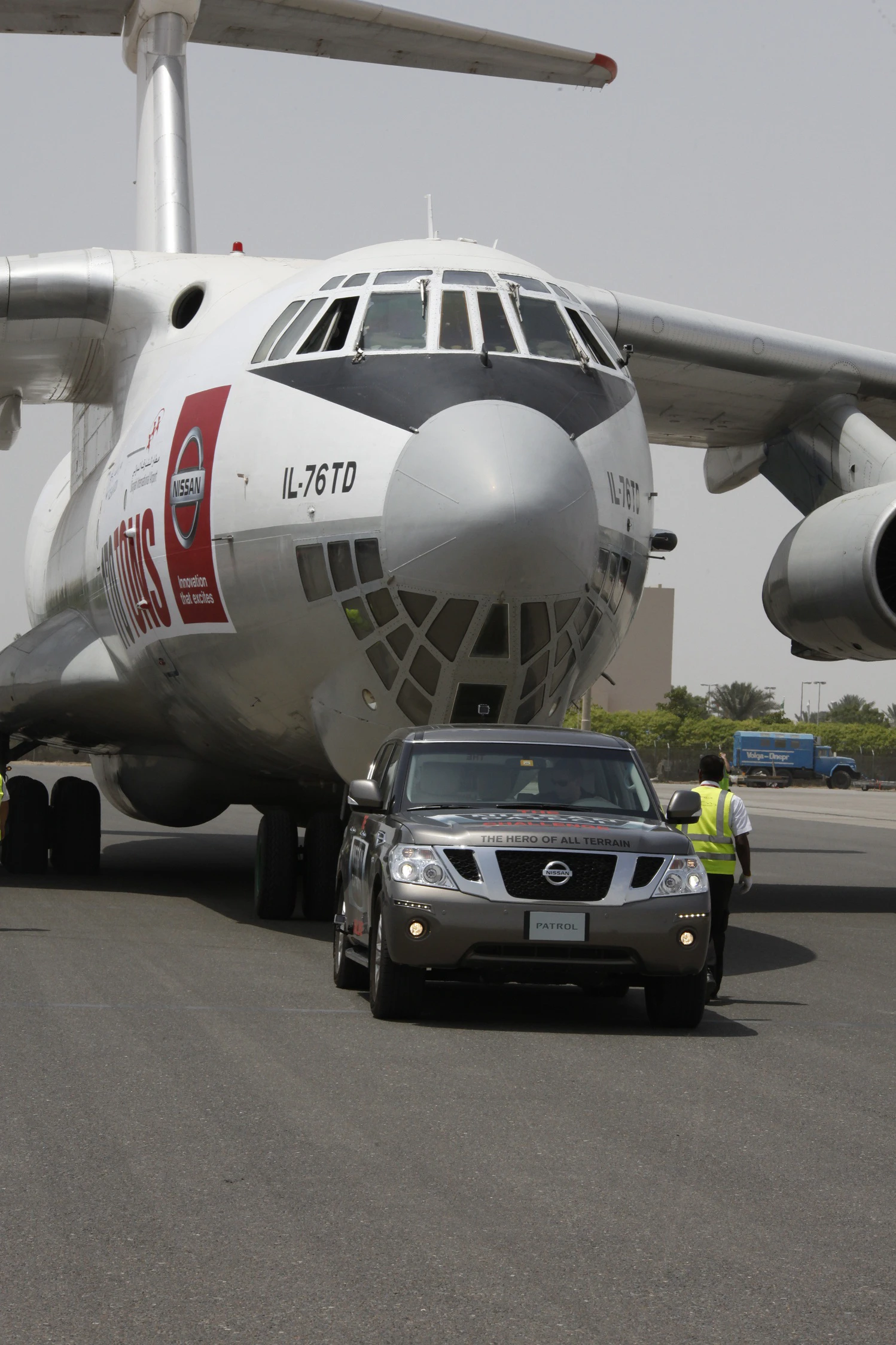 The Nissan Patrol towing the 170.9-ton cargo plane to claim the "heaviest object pulled by any production vehicle" Guinness World Record