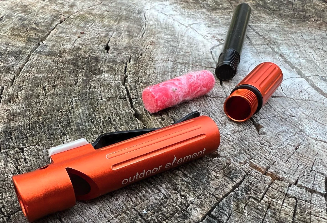 The Fire Flute unscrews for access to its storage capsule and for replacing the ferro rod