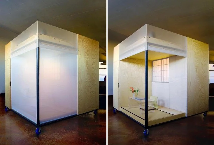 The versatile cube loft features a steel frame, plywood furnishings and houses an office, bed, storage and meditation space