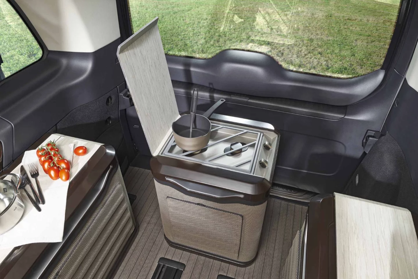 The double-burner cooking module is separate from other kitchen components, keeping things compact and flexible