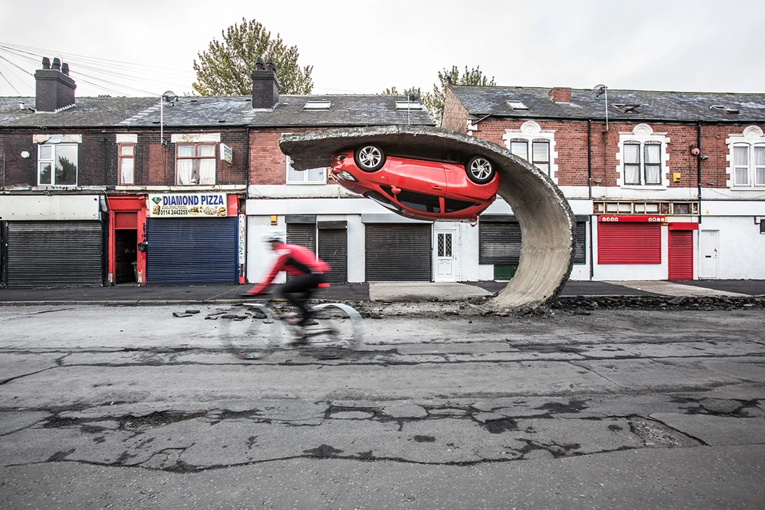 Pick yourself up and pull yourself together was a feat of structural engineering tearing up tarmac and supporting a car upside down