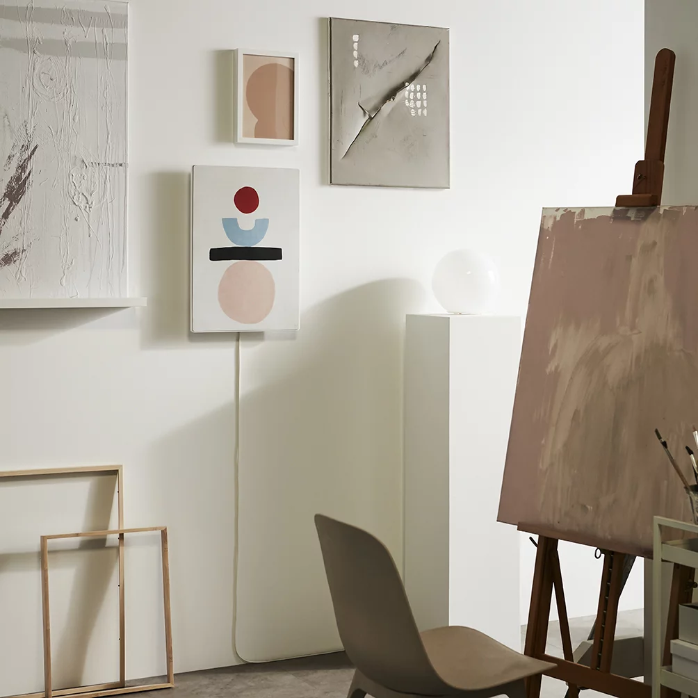 The picture frame speaker comes in black or white, though artwork by Jennifer Idrizi is available as interchangeable fronts