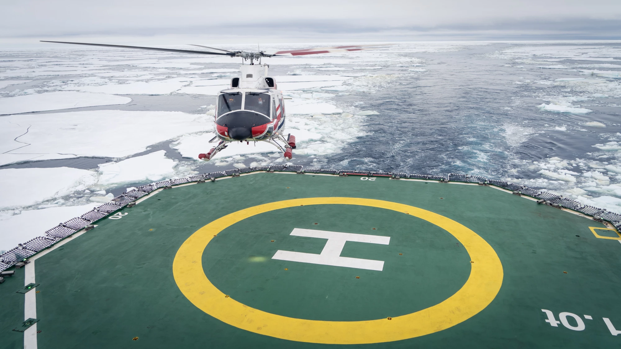 Helicopter landing on expedition ship