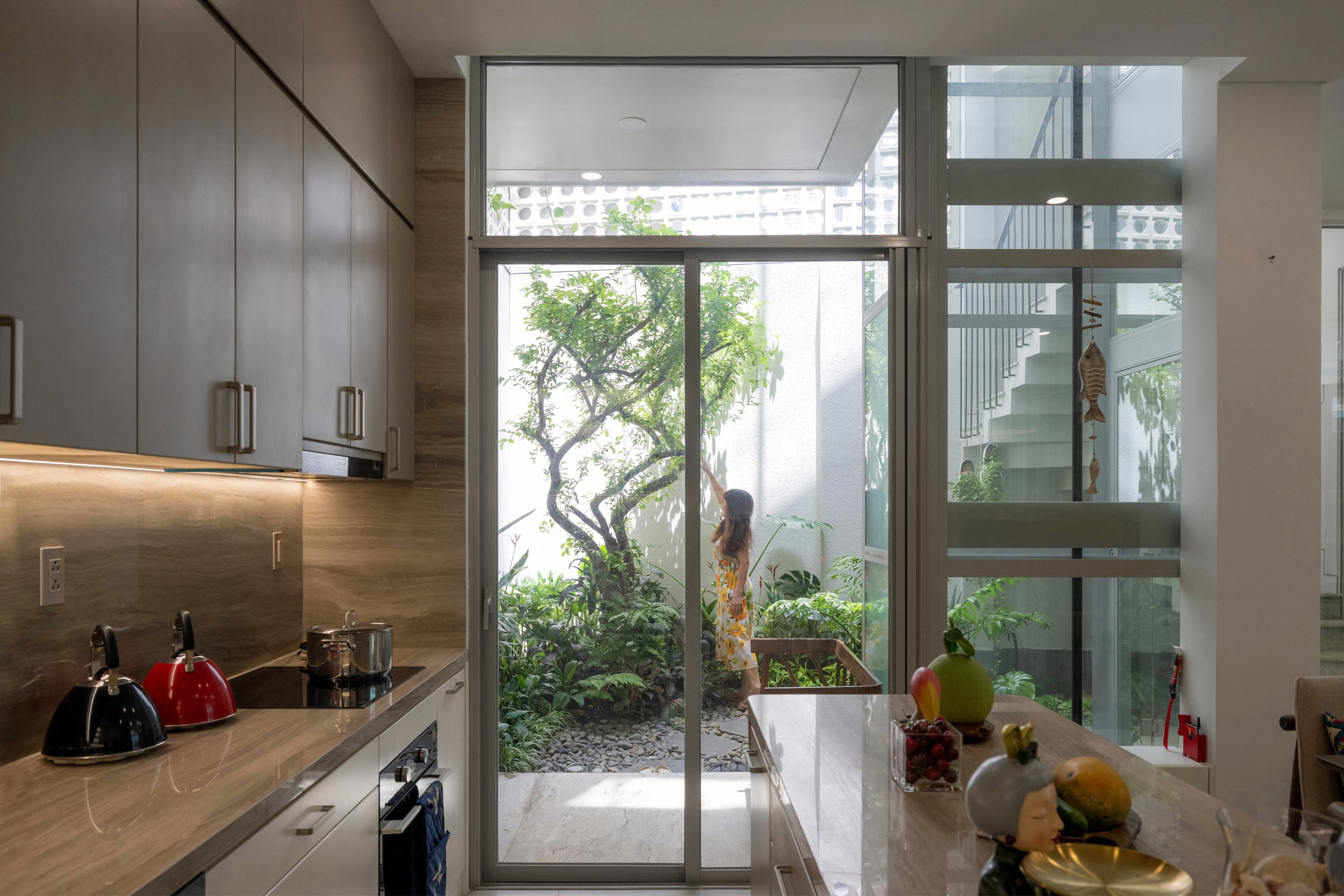 The Secret Garden's inner garden is accessed from the home's kitchen