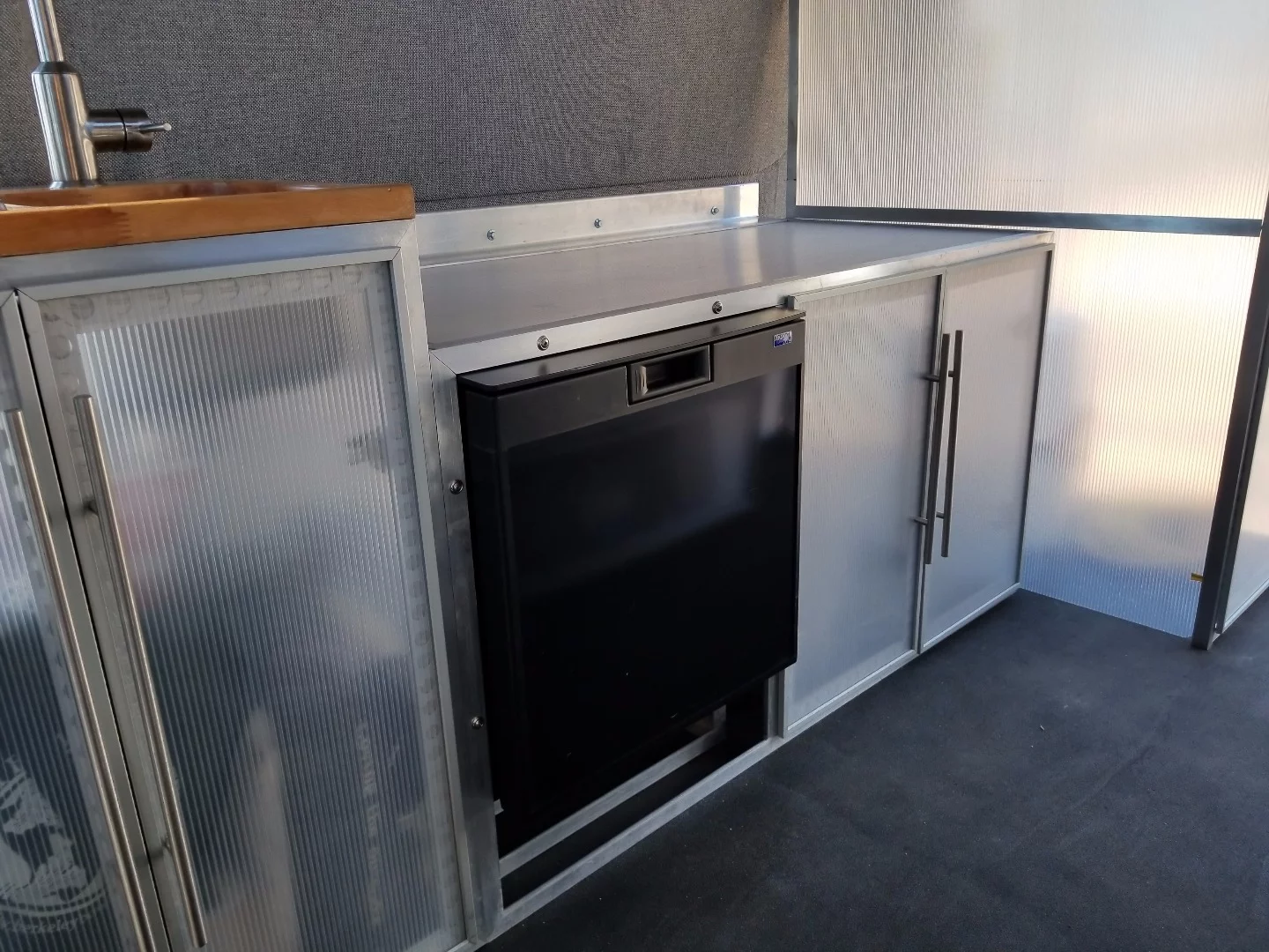 The storage module includes the compressor refrigerator