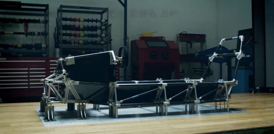 The nodes and carbon fiber tubes form the chassis