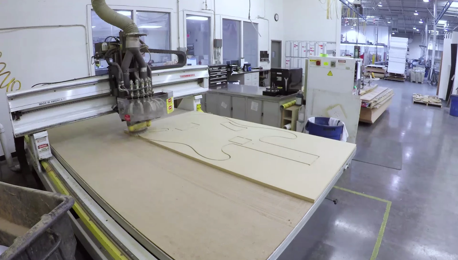 Layers of MDF were machined and then laminated together to form the body and neck