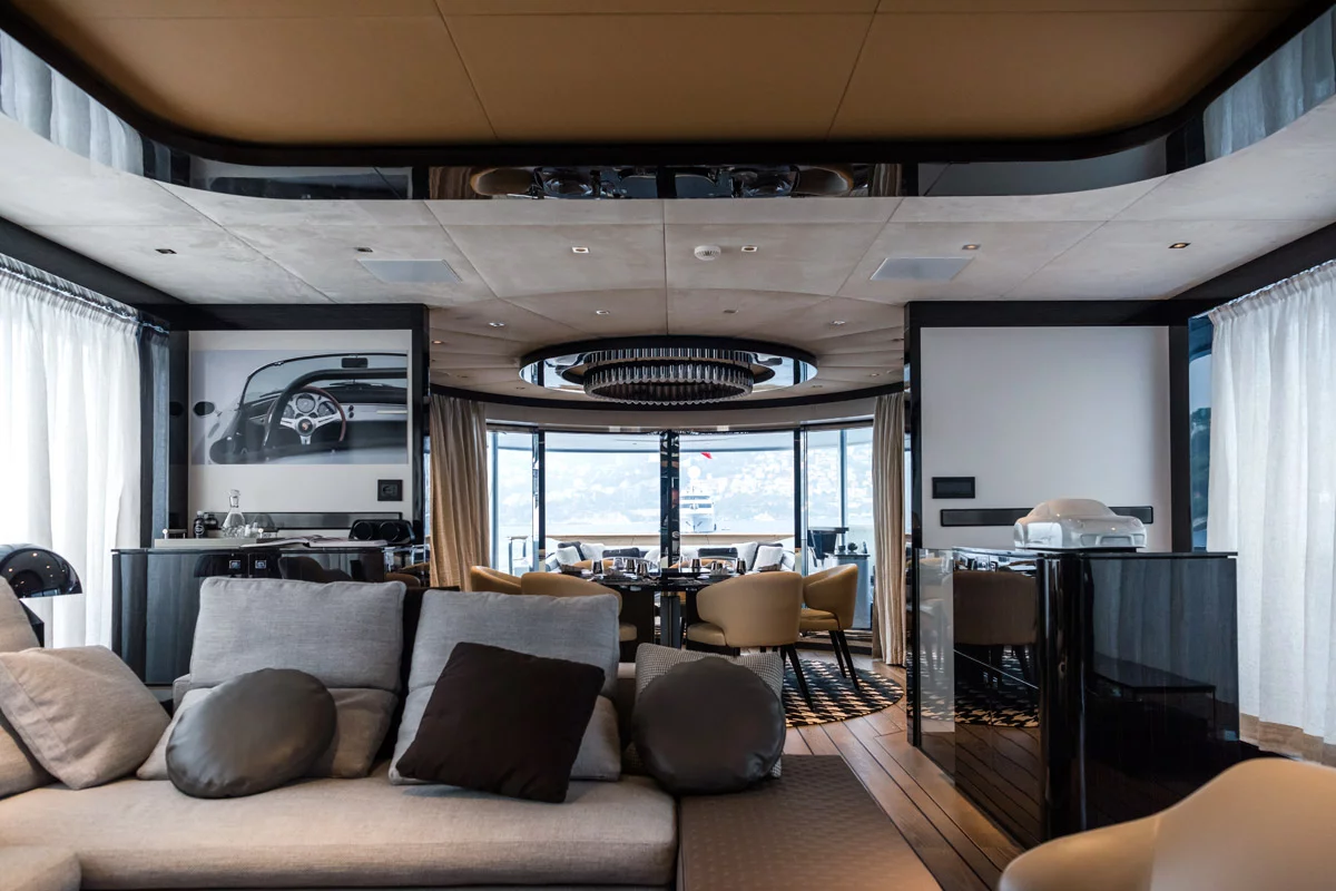 The top deck features a bar, BBQ, dining area, big ol' TV, plus two sunbathing decks and a pool