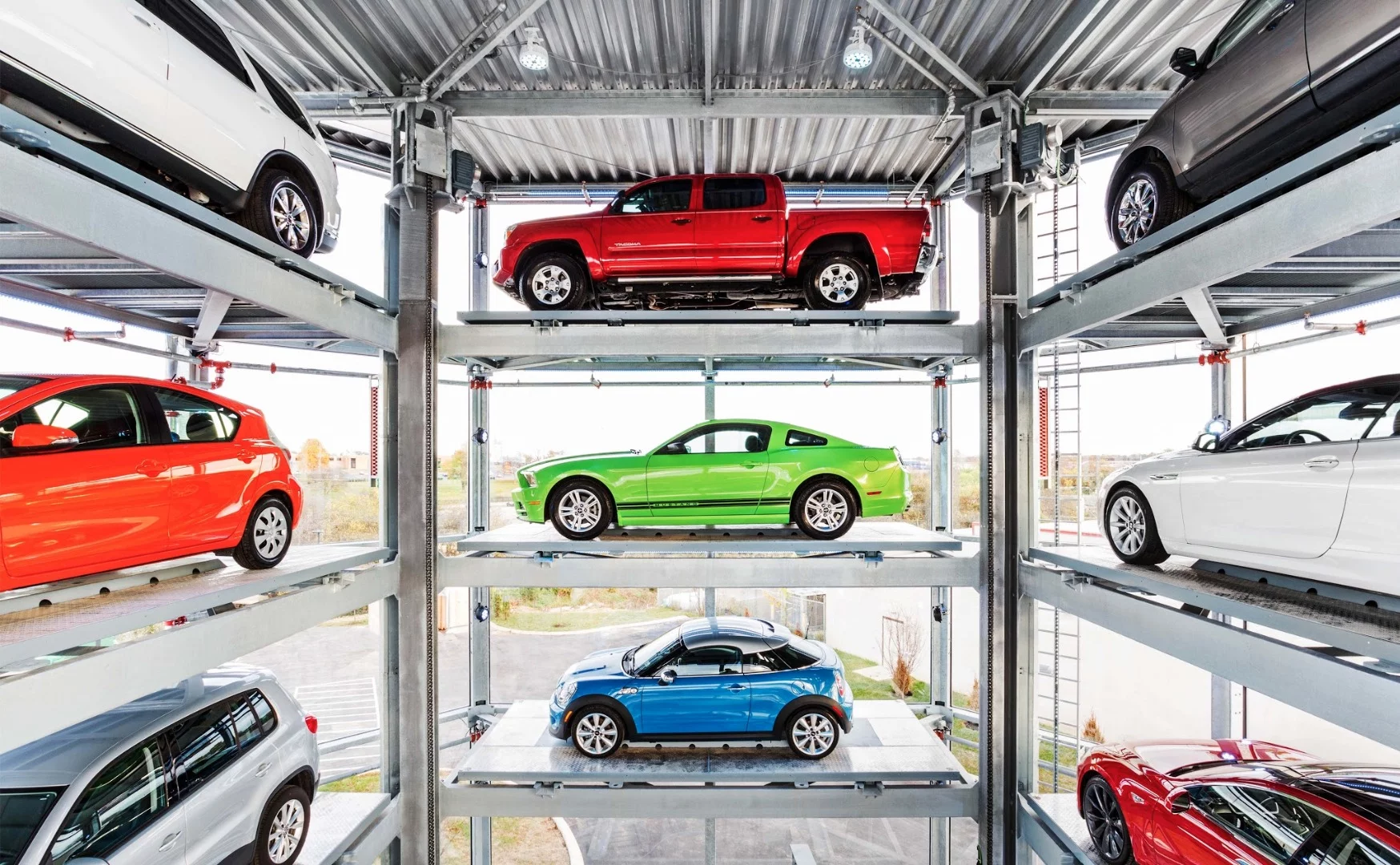 Carvana's available used cars are stacked vertically until sold