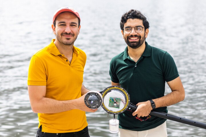Assoc. Prof. Fadel Adib (left) and research assistant Waleed Akbar (right), with the camera that their team developed